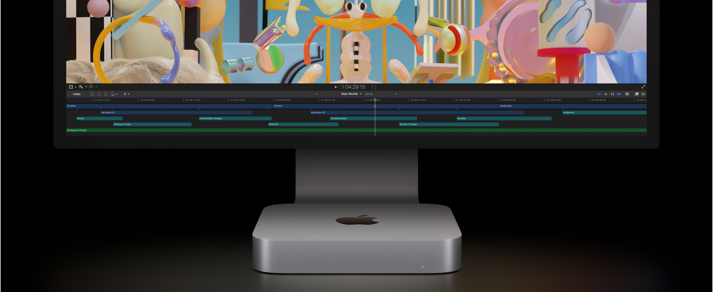 Vooraanzicht van een Mac mini en Studio Display waarop een videobewerkingsproject te zien is in Final Cut Pro.