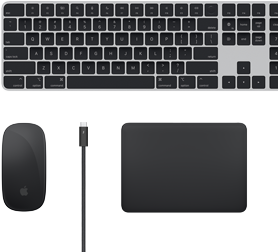 Bovenaanzicht van Mac-accessoires: Magic Keyboard, Magic Mouse, Magic Trackpad en Thunderbolt-kabels.
