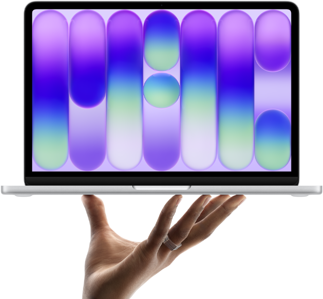 MacBook Neo in de kleur zilver, balancerend op de vingertoppen van een open hand, op het scherm wordt een kleurrijk abstract patroon weergegeven