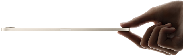 iPad mini, held in hand, side view, thin and lightweight design