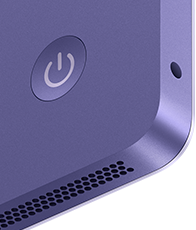 Achterkant van iMac in de kleur paars, met aan/uit-knop, mini-jack-aansluiting en speakermateriaal