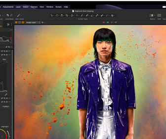 MacBook Pro screen of a photo of a person being edited in Capture One