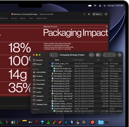 MacBook Pro screen showing PowerPoint being used to create a presentation
