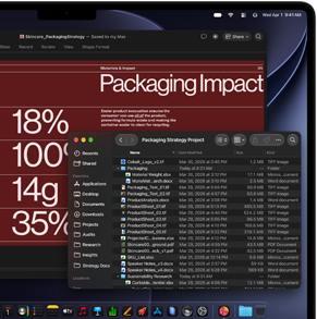 MacBook Pro screen showing PowerPoint being used to create a presentation