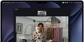 A video call on a MacBook Pro where a woman shows fabrics to two people on the call, with Centre Stage keeping her centred in the frame as she moves around