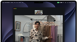 A video call on a MacBook Pro where a woman shows fabrics to two people on the call, with Centre Stage keeping her centred in the frame as she moves around